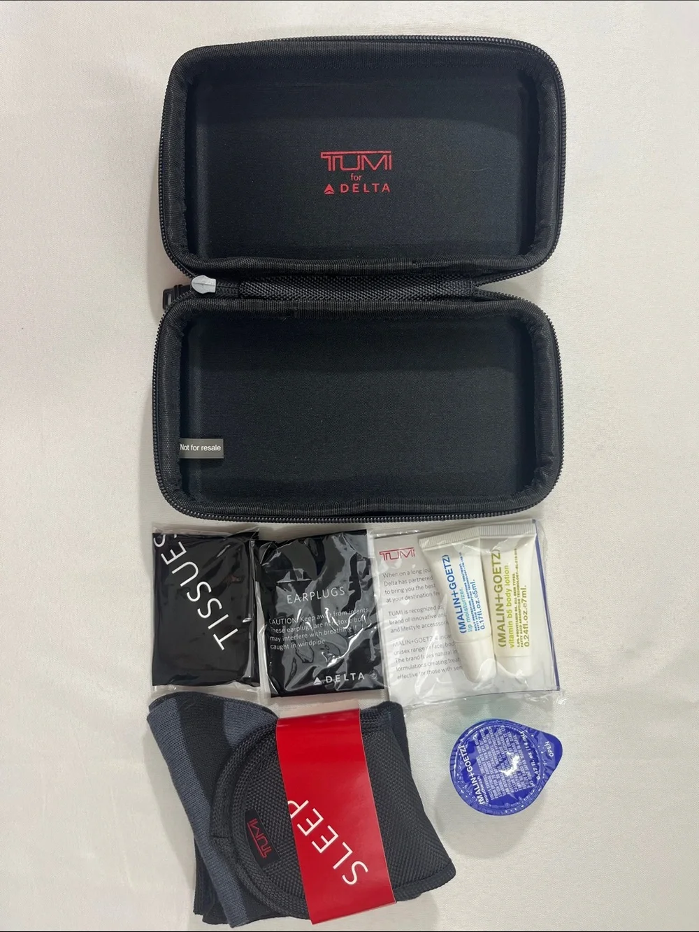 Tumi Accessory/Travel Case - Black - with Travel Samples - new with flaw